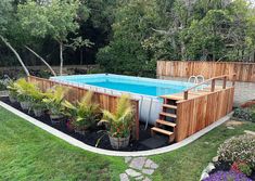 an above ground pool surrounded by plants and trees