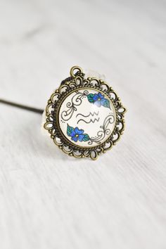 Your zodiac necklace collection is not complete without a Aquarius necklace water sign. Handmade with whimsical pen art and a vintage style, this Aquarius pendant ignites your inner magic. The Aquarius jewelry is painted by hand, making each piece unique and one of a kind, just like you. Click through to see more hand painted jewelry! Junk Jewelry