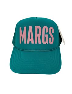 The Margs Trucker Hat is the perfect accessory for any outdoor occasion. With its vibrant green color and pink lettering that proudly proclaims "MARGS", you'll stand out in the crowd. Made in a classic trucker hat style, it offers both comfort and style. Material: 100% Polyester Size: One Size Fits Most Color: Green, Pink Lettering Color may vary by device Scout Bags, Flat Wedges, Hat Style, Soft Sock, Capri Blue, Clear Bags, Sock Gifts, Boots And Sneakers, Vibrant Green