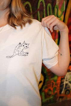 "An ode to our inspiration: Baloo. Highlighting her delightful need to show off her \"flexibility\" whilst giving herself a bath.  Available in black and white in size S, M and L." White Relaxed Fit Top With Cat Print, Cat Bath, Beauty Book, Gender Neutral, Bathing Beauties, Adult Outfits, Tops & Tees, Bath, Top Outfits