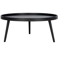 a black coffee table with wooden legs and an oval tray on the top that is shaped like a boat