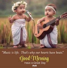 two babies are playing guitar and singing to each other while the caption reads, music is life that's why our hearts have beats good morning have a great day