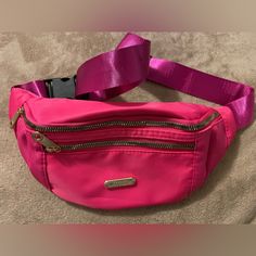 Nwot Pink Fanny Pack This Has A Double Zipper With An Additional Zipper Pocket Inside It Has An Adjustable Strap To Be Worn On The Hip Or As A Crossbody Goldtone Hardware Appx Measurements - 13” Wide - 6” Height Pet Free And Smoke Deee Home Casual Pink Belt Bag With Zipper Closure, Trendy Pink Belt Bag With Pockets, Trendy Pink Belt Bag With Zipper Pocket, Pink Belt Bag With Zipper Pocket, Fanny Pack, Size 13, Inside Pocket, Zipper Pocket, Adjustable Straps