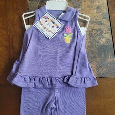 Brand New Never Worn Still Has Tags On It. This Is One Of The Cutest Outfits We Have In The Store Right Now. Loving The Lilac Color With Flower Stitched On. Grab It Before It's Gone And Bring It Home. Vintage New Clothing. Sleeveless School Sets For Spring, Fitted Casual Sets For Playdate, Cute Sleeveless School Sets, Purple Fitted Sets For Playwear, Purple Baby Dress, Purple Summer Playwear Sets, Purple Cotton Playwear Sets, Purple Kids Clothing, Bubble Clothes