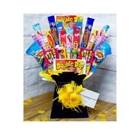 a bouquet of candy and candies in a black vase