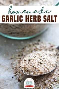 homemade garlic herb salt in a glass bowl and spoon with text overlay that reads homemade garlic herb salt