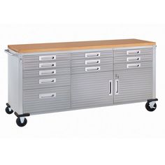 a metal cabinet with wooden top and drawers on casteors is shown in front of a white background