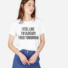 I Feel Like I’m Already Tired Tomorrow (Don’t We All Btw Lol) Crewneck Short Sleeves Ring Spun, Preshrunk 100% Cotton Double Needle Stitched Sleeve And Hem Semi-Fitted Unisex Sizing Size Up For A Looser, Slouchy Fit Other Colors Available For Shirt And Design *Each Hoodie, Sweatshirt Or T-Shirt Is Custom Made And Made To Order. *Add To Bundle Or Comment If You Would Like A Different Color Or A Custom Design On The Back. *Ask Any Questions Prior To Ordering *Offers Welcome* *If You’re New To Posh Trendy White Tops With Funny Text, White Top With Quote Print And Relaxed Fit, Trendy Tops With Funny Text For Everyday, Trendy Relaxed Fit Top With Quote Print, Trendy Short Sleeve Tops With Quote Print, White Tops With Funny Text For Everyday, Everyday Crew Neck Tops With Quote Print, White Relaxed Fit Top With Quote Print, White Cotton Top With Quote Print