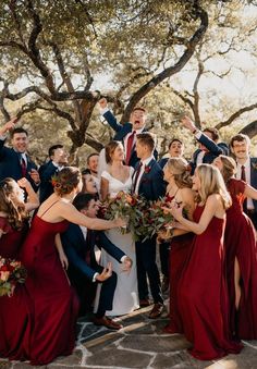 a group of people standing around each other