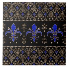 blue and gold fleur de lis on black tile