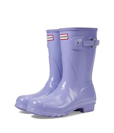 PRICES MAY VARY. The Women's Original Short Rain Boot is a shorter version of the iconic Hunter Original Tall Boot and perfect for wet-weather conditions. Formed of natural rubber, each boot is handcrafted and assembled over three days and then vulcanised for superior protection before having the high gloss finish applied. The Hunter Original tread pattern and comfortable 100% recycled polyester lining completes the design on this 100% waterproof boot. Purple Rain Boots, Short Rain Boots, Tall Boot, Women Hunters, The Hunter, Rain Boot, Wet Weather, Purple Rain, Three Days