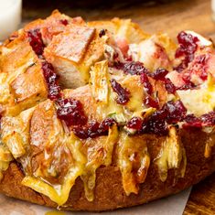 bread with cranberry sauce and cheese on it