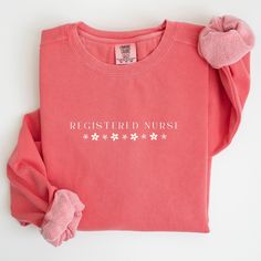 Wonderful design for women who loves Registered nurse design sweatshirt.Grab this design as a gift for your girlfriend,sister,mother or who loves daisy rn nurse sweater.Or make yourself happy to have this cute flower design sweatshirt :) A Registered Nurse sweatshirt is a type of sweater that features a design inspired by the nurses.Registered Nurse sweatshirts are popular among nurse letter sweater lovers and make a great gift for any nurse enthusiast. 🌿 Made from premium quality, soft cotton Letter Sweater, Nurse Sweater, Nurse Design, Design Sweatshirt, Nurse Sweatshirt, Sweat Shirts, Sweater Gift, Registered Nurse, Nursing Tshirts