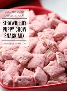 strawberry puppy chow snack mix in a red bowl