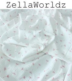 a white sheet with pink flowers on it and the words zellaworlddz