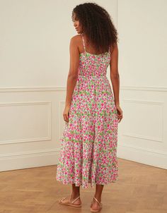 Block-printed by hand in the much-loved Lolita print, the Seychelles dress is a summer favorite you won’t want to take off. We love the pop of neon pink set against the zesty green in this vibrant print. Finished with adjustable spaghetti straps, a full, tiered skirt and rows of elastic under the bust, the Seychelles dress is an effortless and flattering piece you’ll wear again and again. Perfect for beach holidays, warmer days ahead and evenings out. Pink City Prints was founded to preserve the Pink Sleeveless Dress With Vibrant Print, Green Summer Dress With Vibrant Print, Green Vibrant Print Summer Dress, Summer Green Dress With Vibrant Print, Beachwear Midi Dress For Summer Parties, Tropical Dress With Vibrant Print For Day Out, Chic Dresses With Vibrant Print For Summer Parties, Pink Midi Dress For Spring Summer Parties, Pink Midi Dress For Spring And Summer Parties