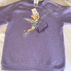 Bnwt Disney Tinker Bell Magical Fairy Embroidered Sweatshirt .. Beautiful Lavender Color Embroidered On One Arm As Well! All My Items Come From Smoke,Covid And Pet Free Home! Bundle Today To Save On Shipping .. Always Accepting Reasonable Offers.. **Please Note If Submitting An Offer At Half Of What The Item Is Listed For It Will Be Respectfully Ignored! Thanks For Checking Out My Closet **Hlknbx** B Elsa Sister, Star Wars Quilt, Disney Magical, Mickey Mouse Sweatshirt, Magical Fairy, Seersucker Pants, Disney Lilo, Tinker Bell, Disney Kids