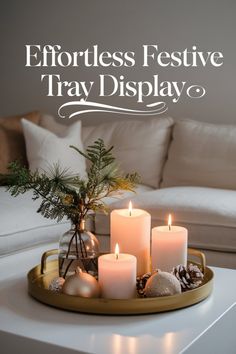 a tray with candles on top of it and the words effort festive tray display