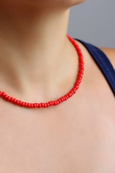 Bright minimalist beaded choker with red czech glass beads, strong double nylon thread, silver tone clasps, silver tone lobster clasp and stainless steel adjustable length chain. Perfect for everyday wear or a pretty gift for someone special! You can wearing it with other chokers, chain necklaces or alone! Total length of necklace is 43 cm or 16.9 inches and 4,5 cm of adjustable length chain. NOTE: in my store you can also find similar necklaces in other colors as in the last photo. The price is Red Beaded Choker Necklace For Summer, Red Tiny Beads Necklace For Summer, Adjustable Red Necklaces For Summer, Minimalist Red Beaded Necklaces, Minimalist Red Beaded Necklace, Red Beach Choker Jewelry, Adjustable Red Choker With Tiny Beads, Red Minimalist Beaded Necklace With Tiny Beads, Minimalist Red Beaded Necklace With Tiny Beads