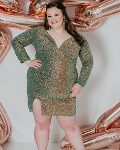 Swap out your accessories and take this plus size dress from workwear to date night in a snap Long Sleeve Glitter Mini Dress For Prom, Long Sleeve Sequin Dress For Homecoming Party, Glitter Long Sleeve Mini Dress For Prom, Long Sleeve Sequin Glitter Dress For Party Season, Long Sleeve Sequin Dress For Holiday Party, Party-ready Long Sleeve Sequin Dress, Long Sleeve Sequin Glitter Dress For Night Out, Glamorous Long Sleeve Bodycon Prom Dress, Long Sleeve Sequin Glitter Dress For Prom