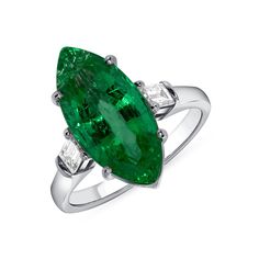 Show off your uniqueness with this Marquise-Cut Emerald Ring. The focal point is the 5.05CT marquise cut Colombian emerald, with only minor enhancements, showing the true authentic beauty of this stone. Colombian emeralds are known for their intense saturation. Shining on each side of the emerald are two 0.15CT baguette diamonds, to help compliment the centerpiece. 5.05CT Marquise Cut Emerald - Columbia Minor 2 x 0.15CT Baguette Diamond 18KT White Gold Luxury Classic Marquise Emerald Ring, Luxury Emerald Ring Marquise Cut, Luxury Classic Marquise Cut Emerald Ring, Luxury Marquise Emerald Diamond Ring, Luxury Marquise Cut Emerald Ring, Authentic Beauty, Baguette Diamonds, Colombian Emeralds, Baguette Diamond