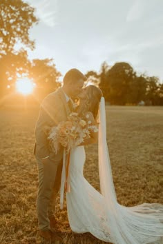 Golden hour wedding photography of the bride and groom sharing a special kiss on their wedding day in late September Treated Like A Princess, Wedding Flowers Boho, Dried Wedding Flowers, Fall Wedding Photos, Wedding Couple Poses Photography