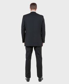 The classic black two-button notch lapel tuxedo is one that never goes out of style no matter if one's playing baccarat in a casino or acting as best man in a wedding. Wear it with or without a vest, or wear it open with a cummerbund. The cut flatters just about anyone with its clean lines. Keep it in your closet and wear it to any formal occasion for years. Features Includes: Tuxedo Jacket, and Pants JACKET: Full Lined,2 Button closure, Notch Lapel. Side Vents PANTS: Flat Front Tapered, 37 Inch Black Tuxedo, Tuxedo Jacket, Wedding Wear, Out Of Style, Modern Fit, Formal Occasion, Get The Look, Clean Lines, A Good Man