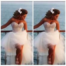 two pictures of a woman in a dress sitting on a railing near the water and looking off to the side