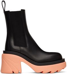 Ankle-high buffed calfskin Chelsea boots in black. Round toe. Elasticized gusset at sides. Buffed calfskin pull-loop at heel collar. Rubber platform midsole in pink. Treaded rubber outsole in brown. Approx. 3.5 heel; 2 platform. Supplier color: Black/Flamingo Bottega Veneta Boots Outfit, Wide Shaft Boots, Bottega Veneta Boots, Black Flamingo, Black Grass, Vintage Wash Jeans, Taupe Boots, Leather Bustier, Leather Knee Boots