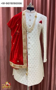 This sherwani includes Sherwani, Pajama/Pajami/Pant, Necklace, Dupatta. For any assistance, Whatsapp us at +91-9079290206 or mail us at heersuhaagchura4@gmail.com Bollywood Style Kundan Sherwani With Dupatta, Bollywood Style Sherwani With Dupatta For Reception, Bollywood Bandhgala With Dupatta For Traditional Ceremonies, Ceremonial Transitional Dupatta With Dabka Detail, Ceremonial Transitional Dabka Dupatta, Bandhgala With Dupatta For Traditional Ceremonies And Festivals, Traditional Bandhgala With Dupatta For Ceremonies, Traditional Drape Bandhgala With Dupatta For Reception, Festive Ceremonial Sherwani With Dupatta