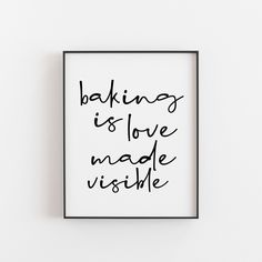 a framed black and white poster with the words baking is love made visible on it