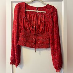 Like New Condition, Never Worn. Doesn’t Fit Me Right! Red Long Sleeve Peasant Top With Floral Print, Long Sleeve Red Peasant Top With Floral Print, Red Floral Print Peasant Top For Fall, Fall Floral Print Red Peasant Top, Fitted Red Peasant Top For Spring, Casual Red Smock Top, Casual Red Smocked Top For Fall, Casual Red Blouse With Smocked Back, Casual Red Smocked Top With Floral Print