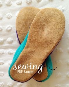 two slippers are laying on top of each other with the words sewing written above them