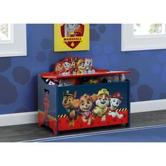 children's toy chest with paw patrol print on the front and bottom shelf in red