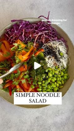 a bowl full of vegetables and sprouts with the words simple noodle salad