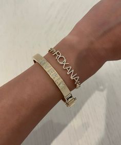 This amazing custom bracelet has so many great options! Customize it with a name, date, initials or something unique! You can add diamond, black diamond, emerald, sapphire or ruby dots! Available in 14K Yellow, White or Rose Gold Price is based on the number of letters, numbers, dots, etc. needed. Width: 8mm FINAL SALE Personalised Bangle, Art Jewelry Design, Custom Bracelet, Vs Diamond, Diamond Bangle, Name Bracelet, Cuban Link Chain, Gold Price, Cuban Link