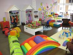 the children's playroom is filled with toys