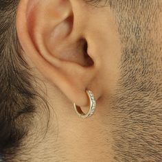 Our mens solid gold hoops feature an enclosed channel setting and 10 Natural VS Flawless diamonds for an air of luxury. Perfect for formal occasions or to a casual night out. Single option comes with one earring, double options comes with the set.Diamond InfoVS1/VS2 G Color 13MM Small HoopThickness: 2.8mmDiameter: 13mmset 0.4 ctw 15MM Medium Hoop (Shown on model)Thickness: 3.1mmDiameter:14.8mmset 0.54 ctw Designed for you in 8-10 business days. Men Gold Earrings, Ear Rings For Men, Mens Gold Hoop Earrings, Boys Earrings, 22k Gold Chain, Earring For Men, Earrings Men, Gold Earrings For Men, Platinum Bracelet