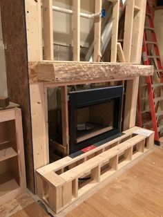 an unfinished fireplace being built in a home