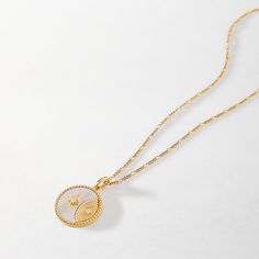 Inspired by vintage coins found in East Asia, these modern-day talismans carry icons of good fortune. The Solar Necklace, with a microcosmic galaxy of sun, star, and a moon symbolises dreams and aspirations for the future. In the world of feng shui, mother of pearl is believed to symbolize wealth and good luck. You go, Luxury Silver Plated Necklace, White Gold Plated Round Chain Necklace, Formal Round Plated Necklace, Luxury Necklace With Adjustable Chain And Round Pendant, Luxury Silver Plated Necklaces, Elegant Gold Coin Necklace Tarnish Resistant, Elegant Round Necklaces With Silver Plating, Elegant Round Plated Necklace, White Plated Pendant Necklaces