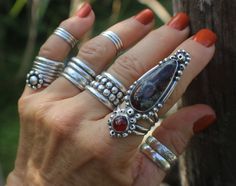 "EUDIALYTE STATEMENT RING WITH CARNELIAN -- handcrafted in oxidized STERLING SILVER -- ornamental oxidized silver work ARTISAN MADE --- Power Ring US SIZE 8.25 (8 1/4)  AN ULTRA-UNIQUE AND EXQUISITE pairing of EUDIALYTE AND CARNELIAN in this one of a kind designer statement ring, set in oxidized Sterling Silver, created for the bohemian jewelry lover and wearable art collector.  Signed and Dated 2023.   Perhaps a true power ring with healing properties from both of these powerful gemstones. A BI Handmade Bohemian Carnelian Ring, Bohemian Handmade Carnelian Rings, Artisan Hand Forged Red Jewelry, Unique Handmade Garnet Ring, Ring Of Power, Balancing Emotions, Big Stone Ring, Estilo Hippy, Wearable Art Jewelry