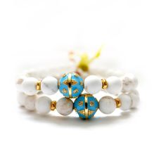 Handcrafted one-of-a-kind white matte turquoise gemstone bracelets, turquoise enamel center ball with pave diamonds, a silk velvet ribbon with vintage brass danglers. Wear this chic bracelet set alone or stacked other bracelets. Note: Priced as a set or just a single one. Matte white Turquoise gemstones Enamel and pavé diamonds Bracelet measures 7" inches Made with love in Los Angeles Complimentary gift wrapping provided All sales final. Diamonds Bracelet, Chic Bracelet, White Turquoise, Twin Set, Velvet Ribbon, Silk Velvet, Gemstone Bracelets, Turquoise Gemstone, Pave Diamonds