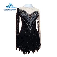 a black and white figure skating dress with sequins on the shoulders, long sleeves and