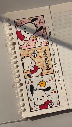 an open notebook with stickers on it and a notepad in front of it