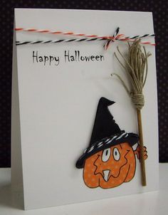 a happy halloween card with a witch's hat on it and a broom sticking out of the front