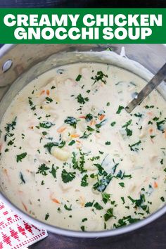 creamy chicken gnocchi soup in a pot with a spoon