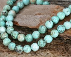 "What can't you do with these large round beauties? We're in love with both the color and pattern of these turquoise rounds at Lima HQ. Add to beaded stretch bracelets, anchor drop earrings, and more. Sold as: 15-16\" strand (approximately 40 beads per strand) Peruvian turquoise, also known as chrysocolla turquoise, is a gorgeous blue/green color.  On most beads, you'll find delicate veins, which we love because they add to the natural character of the stone. Peruvian turquoise beads are simply stunning. We were thrilled to find this stone! Scientifically, this mineral is: CuAl6(PO4)4(OH)8. Warning - high school chemistry refresher coming... 😂 - If you remember any chemistry, you know that the \"Cu\" above stands for copper. When you see a beautiful, natural green color in a stone, you ca High School Chemistry, Blue Green Color, Dalmatian Jasper, Ann Arbor, Beaded Stretch Bracelet, Heart Beads, Turquoise Beads, Stretch Bracelets, Czech Glass