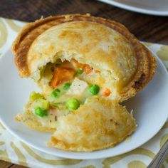 a chicken pot pie on a white plate