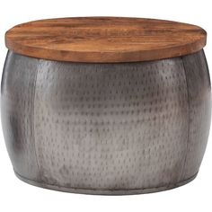 a round metal table with wooden top