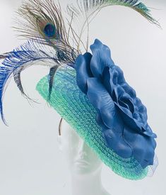 Handmade by Featured Milliner of The Kentucky Derby Museum 2023 & 2024! Turquoise base with oversized navy floral and a feather accents. Attaches with headband.  Not taking customs this year--Derby 150 is going to be massive and mom life keeps me running! However, happy to suggest pieces that will coordinate with your outfit. If you don't love the way this attaches to your head--message me!  I can swtich *most* pieces to your preference. Clip, Headband OR Elastic Cord  NOTE: Heavier pieces with Luxury Turquoise Fascinator For Royal Ascot, Head Message, Clip Headband, Derby Fascinator, Kentucky Derby Hat, Derby Hat, Fascinator Hats, Gold Line, Derby Hats